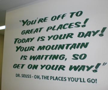 Hand painted lettering on drywall.