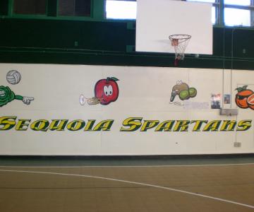 Wall graphics are combination of full color prints and hand painted lettering.